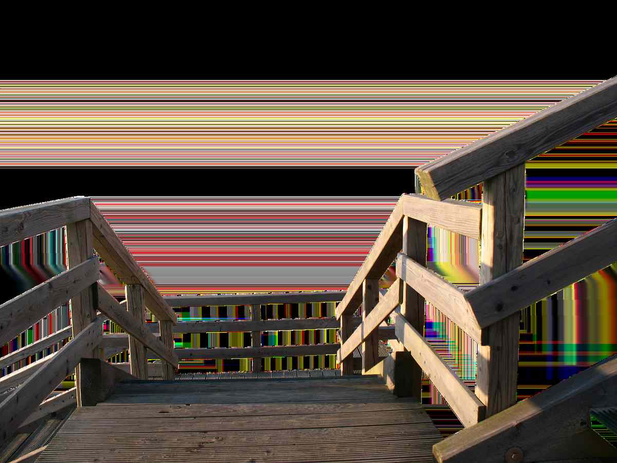Escaliers en bois menant à une plateforme extérieure couleur dégradée