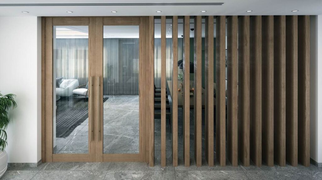 Porte en bois avec vitres, séparant deux pièces