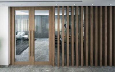 Porte en bois avec vitres, séparant deux pièces